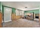 Spacious room with tile flooring, a large window and a doorway to the outside at 4928 Petunia Ct, New Port Richey, FL 34652