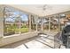 Enclosed patio with great backyard views perfect for relaxing and enjoying the outdoors at 4928 Petunia Ct, New Port Richey, FL 34652