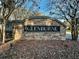 Glenburne Community Sign features stacked stone and lush landscaping at 5011 Glenburne Dr, Spring Hill, FL 34609