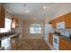 Kitchen with island, granite counters and stainless steel appliances at 5011 Glenburne Dr, Spring Hill, FL 34609