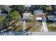 Single-story home with a large backyard, mature trees, and convenient access to nearby amenities and green spaces at 5602 Bay Blvd, Port Richey, FL 34668
