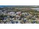 Real estate showcasing a home nestled in a community with lush trees and nearby conveniences at 5602 Bay Blvd, Port Richey, FL 34668