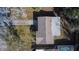 Bird's eye view of the roof, driveway, and yard, highlighting the property's layout at 5602 Bay Blvd, Port Richey, FL 34668