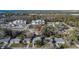 Real estate showcasing a home nestled in a community with lush trees and nearby conveniences at 5602 Bay Blvd, Port Richey, FL 34668