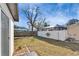 Fenced backyard with healthy lawn and patio with room for outdoor living at 5602 Bay Blvd, Port Richey, FL 34668