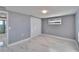 Bedroom features marble floors, a large closet and a window for natural lighting at 5602 Bay Blvd, Port Richey, FL 34668