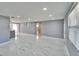 Open living space with marble floors, neutral paint and recessed lighting at 5602 Bay Blvd, Port Richey, FL 34668