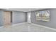 Bright living space with new marble floors, new windows, new door, and fresh paint at 5602 Bay Blvd, Port Richey, FL 34668