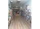 Spacious community library with floor to ceiling bookshelves filled with a wide variety of books at 6015 19Th N St # 115, St Petersburg, FL 33714
