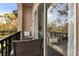 Inviting balcony with seating area, perfect for enjoying the outdoor views and a relaxing atmosphere at 628 Arbor Lake Ln, Tampa, FL 33602