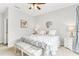 Inviting bedroom with a patterned bedspread, bedside tables with lamps, and a cozy ambiance at 628 Arbor Lake Ln, Tampa, FL 33602