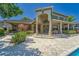 Community clubhouse exterior featuring outdoor seating at 628 Arbor Lake Ln, Tampa, FL 33602