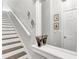 Hallway features an ornate mirror, staircase and door at 628 Arbor Lake Ln, Tampa, FL 33602