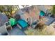 Townhome aerial view featuring private covered parking and mature landscaping at 6910 Lake Place Ct, Tampa, FL 33634