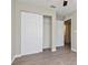 Bedroom with wood-look floors and closet with sliding doors at 701 15Th S Ave, St Petersburg, FL 33701