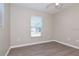 Bedroom featuring wood-look floors, neutral walls, and window with blinds at 701 15Th S Ave, St Petersburg, FL 33701
