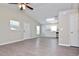 Open floor plan with living room and kitchen, featuring wood-look floors at 701 15Th S Ave, St Petersburg, FL 33701