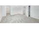 Large bedroom featuring neutral carpet, a closet, and a bright, open space at 7529 62Nd N Way, Pinellas Park, FL 33781