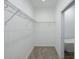 Walk-in closet with wire shelving and neutral carpet at 7529 62Nd N Way, Pinellas Park, FL 33781