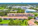 Aerial view of the community shows the well-maintained landscaping and building exteriors at 7623 Radcliffe Cir # 211A, Port Richey, FL 34668