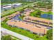 Aerial view of the community shows the convenient parking and landscaping at 7623 Radcliffe Cir # 211A, Port Richey, FL 34668