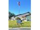 Community sign with American flag waving at 7623 Radcliffe Cir # 211A, Port Richey, FL 34668