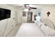 Comfortable bedroom featuring a plush bed, coordinating furniture, and ample natural light at 7623 Radcliffe Cir # 211A, Port Richey, FL 34668