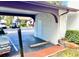 Community parking spot under the carport, conveniently located near the entrance of the condo at 7623 Radcliffe Cir # 211A, Port Richey, FL 34668
