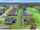 Aerial view of homes backing onto the golf course at 8977 Players Dr, Brooksville, FL 34613