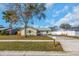 Lovely single-story home with a well-maintained lawn and landscaping, complemented by a mailbox and a sidewalk at 10906 Covey Ct, Tampa, FL 33625