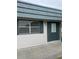 Home exterior with shutters and visible address at 1811 Bedford Ln # 162, Sun City Center, FL 33573