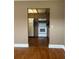This kitchen has white appliances, wooden cabinets and is easily accessible from the other rooms at 1811 Bedford Ln # 162, Sun City Center, FL 33573