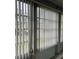 Window with vertical blinds allows natural light into the room at 1811 Bedford Ln # 162, Sun City Center, FL 33573
