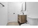 Bathroom featuring a wooden vanity at 2540 W Pine St, Tampa, FL 33607