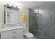 Modern bathroom featuring a glass enclosed shower, sleek vanity, and contemporary fixtures at 3301 Bayshore Blvd # 1908B, Tampa, FL 33629