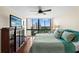 Bedroom showcasing a beautiful view, a ceiling fan, and hardwood floors with a patterned area rug at 3301 Bayshore Blvd # 1908B, Tampa, FL 33629