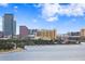 Stunning cityscape featuring modern architecture with a waterfront vista under a sunny, blue sky at 3301 Bayshore Blvd # 1908B, Tampa, FL 33629