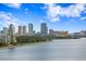 Beautiful cityscape view featuring tall buildings against a blue sky and waterside location at 3301 Bayshore Blvd # 1908B, Tampa, FL 33629