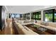 Light filled clubhouse featuring large seating areas and floor to ceiling windows at 3301 Bayshore Blvd # 1908B, Tampa, FL 33629