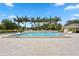 Inviting community pool surrounded by comfortable lounge chairs and lush palm trees at 3301 Bayshore Blvd # 1908B, Tampa, FL 33629