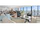 Open concept living room with dining area, showcasing waterfront views and modern furnishings at 3301 Bayshore Blvd # 1908B, Tampa, FL 33629
