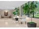 Comfortable lobby featuring lounge seating and large indoor plants at 3301 Bayshore Blvd # 1908B, Tampa, FL 33629