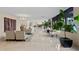 Extensive building lobby featuring indoor plants and seating areas at 3301 Bayshore Blvd # 1908B, Tampa, FL 33629