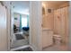 Clean bathroom showcasing vanity, toilet, and shower at 4010 N Lockwood Ridge Rd, Sarasota, FL 34234