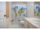 Bathroom featuring a unique world map shower curtain with simple finishes at 4010 N Lockwood Ridge Rd, Sarasota, FL 34234