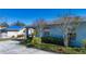 Charming home with well-kept landscaping, complemented by a cozy outdoor space at 4010 N Lockwood Ridge Rd, Sarasota, FL 34234