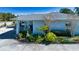 Charming home exterior with well-maintained landscaping and a welcoming entrance at 4010 N Lockwood Ridge Rd, Sarasota, FL 34234