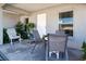Inviting front porch with a seating area, providing a welcoming entrance to the home at 4010 N Lockwood Ridge Rd, Sarasota, FL 34234