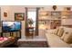 Comfortable living room featuring a built-in display and a cozy seating area at 4010 N Lockwood Ridge Rd, Sarasota, FL 34234