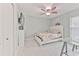 Comfortable bedroom with a ceiling fan, closet and lots of natural light at 4810 Centerbrook Ct, Tampa, FL 33624